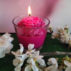 Bougie fleur fuchsia dans sa verrine