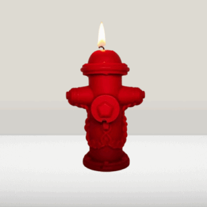 Bougie miniature d'un poteau incendie rouge