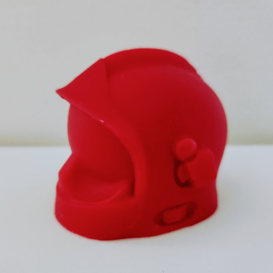 casque de pompier miniature en cire rouge