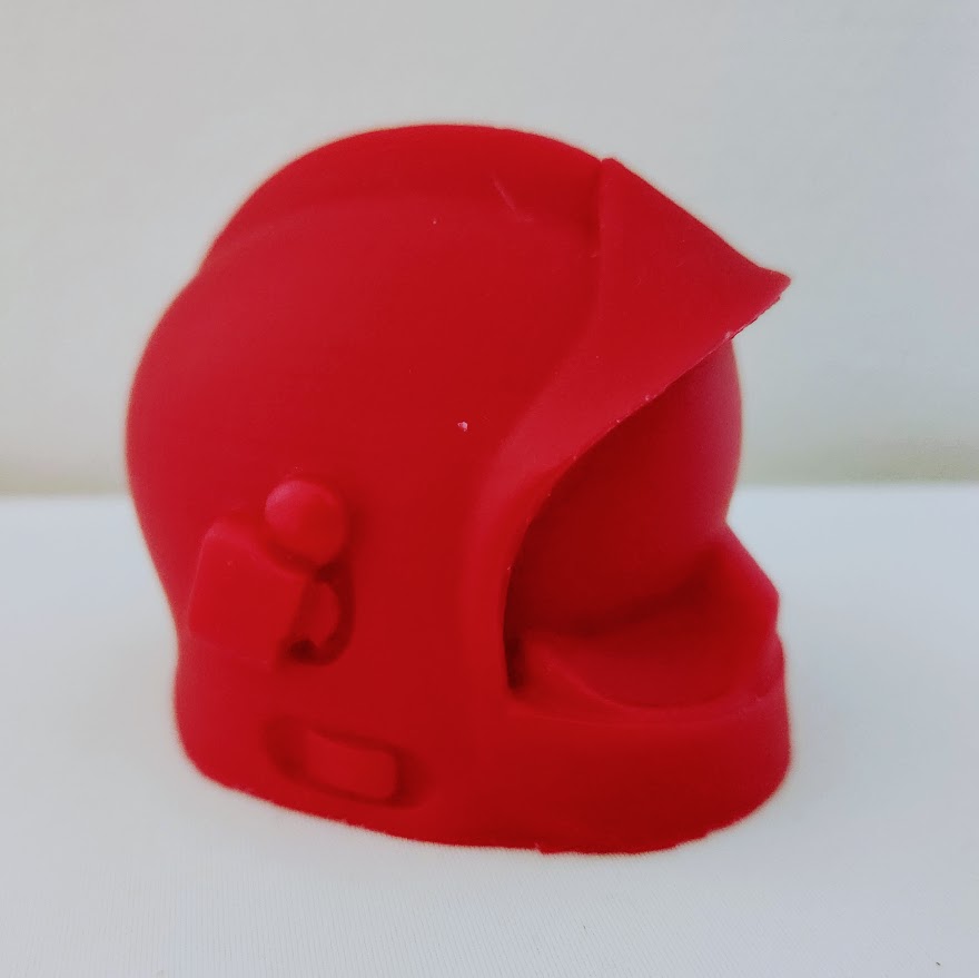 casque de pompier miniature en cire rouge